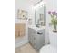 Bathroom with gray vanity and large mirror at 704 Gumbo Limbo Ln., Myrtle Beach, SC 29579