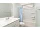 Bathroom with bathtub, shower, white vanity, and marble countertop at 8044 Fort Hill Way, Myrtle Beach, SC 29579