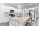 Modern kitchen with white cabinets, granite countertops, and stainless steel appliances at 8044 Fort Hill Way, Myrtle Beach, SC 29579