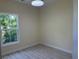 Spacious bedroom with large window and light grey laminate flooring at 908 Merriman Rd., Georgetown, SC 29440