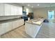 Modern kitchen with white cabinets, granite countertops and island at 908 Merriman Rd., Georgetown, SC 29440