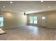 Spacious living room with hardwood floors and lots of natural light at 908 Merriman Rd., Georgetown, SC 29440