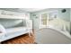 Bedroom with twin-over-full bunk bed and additional twin bed at 917 9Th Ave. S, North Myrtle Beach, SC 29582