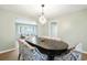 Dining room with a dark wood table and patterned chairs at 917 9Th Ave. S, North Myrtle Beach, SC 29582