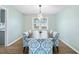Dining area with a dark wood table and patterned chairs at 917 9Th Ave. S, North Myrtle Beach, SC 29582