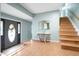 Inviting entryway with hardwood floors and elegant console table at 917 9Th Ave. S, North Myrtle Beach, SC 29582