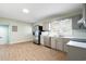 Modern kitchen with stainless steel appliances and light gray cabinets at 917 9Th Ave. S, North Myrtle Beach, SC 29582