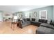 Relaxing living room with sectional sofa and hardwood floors at 917 9Th Ave. S, North Myrtle Beach, SC 29582