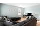 Comfortable living room, featuring a sectional sofa and large TV at 917 9Th Ave. S, North Myrtle Beach, SC 29582