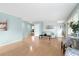 Light-filled living room with hardwood floors and a view into the kitchen at 917 9Th Ave. S, North Myrtle Beach, SC 29582