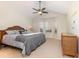 Large main bedroom with bay window, ceiling fan, and carpeted floors at 1133 Spalding Ct., Surfside Beach, SC 29575