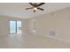 Bedroom with tile floors and access to patio at 1301 Pridgen Rd. # 1104, Myrtle Beach, SC 29577