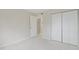 Bedroom with double door closet and access to hallway at 1301 Pridgen Rd. # 1104, Myrtle Beach, SC 29577