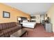 King-size bed, kitchenette, and sofa in the room at 1501 S Ocean Blvd. # 530, Myrtle Beach, SC 29577