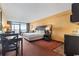 Hotel room with a king bed, ocean view, and kitchenette at 1501 S Ocean Blvd. # 530, Myrtle Beach, SC 29577