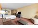 King-size bed and sitting area with small table at 1501 S Ocean Blvd. # 530, Myrtle Beach, SC 29577