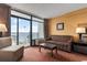 Living room with ocean view and comfortable sofa at 1501 S Ocean Blvd. # 530, Myrtle Beach, SC 29577