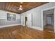 Bedroom with hardwood floors and built-in shelving at 205 S Nichols St., Nichols, SC 29581