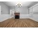 Bright dining room with hardwood floors and fireplace at 205 S Nichols St., Nichols, SC 29581