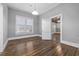 Formal dining room with hardwood floors and access to living room at 205 S Nichols St., Nichols, SC 29581