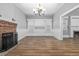 Elegant dining room, hardwood floors, and fireplace at 205 S Nichols St., Nichols, SC 29581