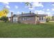 Brick house with side view and lawn at 205 S Nichols St., Nichols, SC 29581