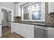 Bright kitchen featuring white cabinets and a walk-in pantry at 205 S Nichols St., Nichols, SC 29581