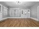 Bright living room featuring hardwood floors and a fireplace at 205 S Nichols St., Nichols, SC 29581