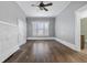 Large living room featuring hardwood floors and fireplace at 205 S Nichols St., Nichols, SC 29581