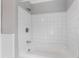 Bathroom with a shower/tub combo and white tile at 2103 Loblolly St., Georgetown, SC 29440