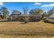 Brick ranch house with a large yard and detached garage at 2103 Loblolly St., Georgetown, SC 29440