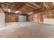 Unfinished garage with shelving and overhead door at 2103 Loblolly St., Georgetown, SC 29440