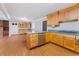 Kitchen with wood cabinets, island, and stainless steel appliances at 2103 Loblolly St., Georgetown, SC 29440