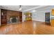 Living room with brick fireplace and built-in shelving at 2103 Loblolly St., Georgetown, SC 29440
