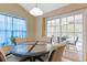 Kitchen's dining area with access to a screened patio overlooking the water at 225 Marsh Hawk Dr., Myrtle Beach, SC 29588