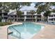 Refreshing outdoor pool with plenty of lounge chairs for sunbathing at 250 Maison Dr. # H-10, Myrtle Beach, SC 29572