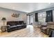 Living room with hardwood floors and comfy seating at 3 Meadow Oak Dr., Surfside Beach, SC 29575