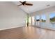 Bright living room with water views and hardwood floors at 4510 Lightkeepers Way # H-33, Little River, SC 29566