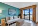 Living room with ocean view and comfortable sofa at 4800 S Ocean Blvd. # 412, North Myrtle Beach, SC 29582