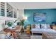 Bright living room with comfy seating, coastal decor, and a small dining area at 4800 S Ocean Blvd. # 412, North Myrtle Beach, SC 29582