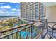 Balcony with ocean and pool views; chairs and table included at 4800 S Ocean Blvd. # 412, North Myrtle Beach, SC 29582
