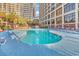 Inviting freeform pool with plenty of lounge chairs at 4800 S Ocean Blvd. # 412, North Myrtle Beach, SC 29582