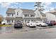 Front view of a three-unit building, with parking in front and landscaping at 500 Fairway Village Dr. # 6B, Myrtle Beach, SC 29588