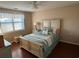 Bedroom with a large bed and plenty of natural light at 5001 Little River Rd. # W-506, Myrtle Beach, SC 29577