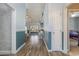 Bright hallway with wood floors, leading to living areas at 604 Mcclain Ct., Conway, SC 29526