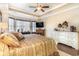 Main bedroom with king bed, fireplace and built-in shelving at 646 Uniola Dr., Myrtle Beach, SC 29579