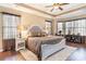 Elegant main bedroom with a king-size bed and plenty of natural light at 646 Uniola Dr., Myrtle Beach, SC 29579