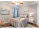 Charming bedroom with a full-size bed and soft color scheme at 646 Uniola Dr., Myrtle Beach, SC 29579