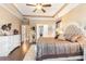 Spacious main bedroom with large bed and access to other rooms at 646 Uniola Dr., Myrtle Beach, SC 29579