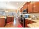 Modern kitchen with stainless steel appliances and an island at 646 Uniola Dr., Myrtle Beach, SC 29579